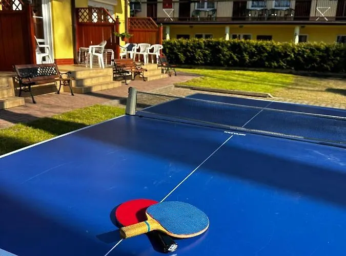 Dom Pod Sosnami 게스트하우스 3*